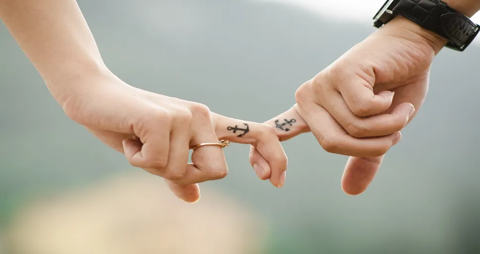 if a guy initiates a hug goodbye - couple, hands, tattoos
