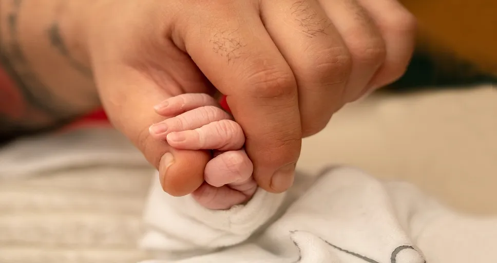 signs he doesn't want you sexually - baby's hand, newborn, small hand